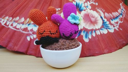 High angle view of amigurumi crochet on table