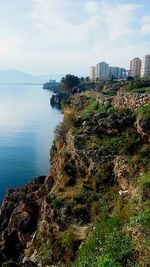 Scenic view of landscape against cloudy sky