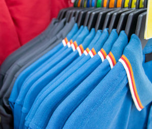 Close-up of clothes rack at store