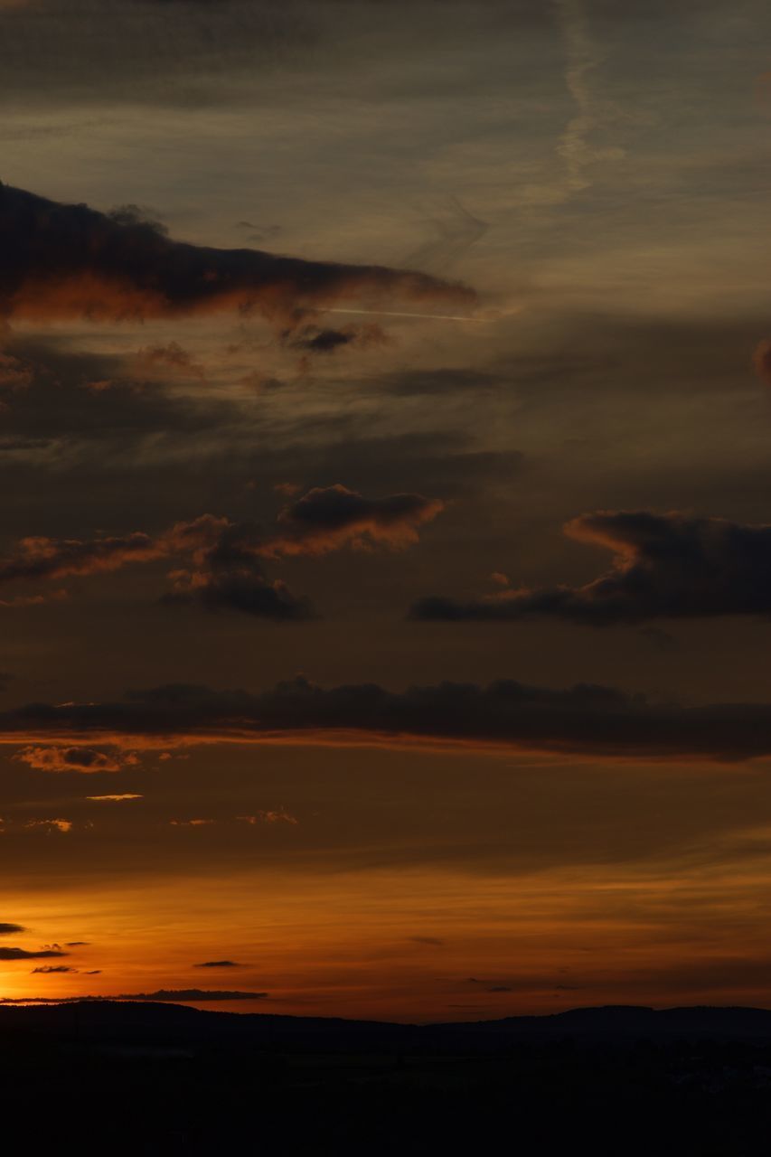 SCENIC VIEW OF DRAMATIC SKY AT SUNSET