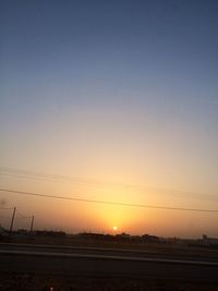 Scenic view of landscape at sunset