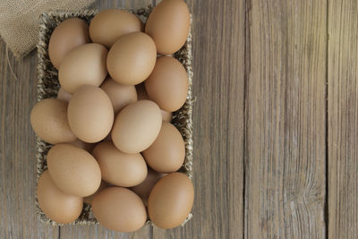 High angle view of eggs in container on table