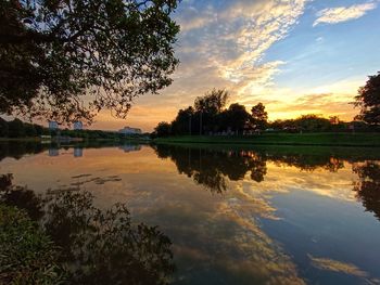 Scenic view of lake against sky during sunset