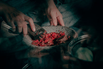 High angle view of man preparing food