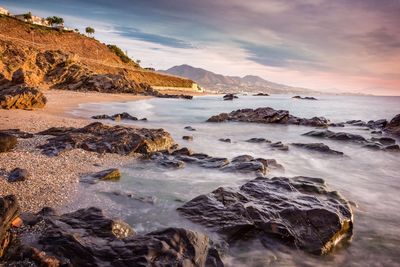 Scenic view of sea against sky during sunset