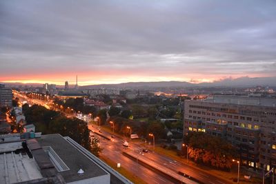 Aerial view of city at sunset