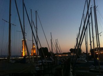 Boats in harbor at dusk