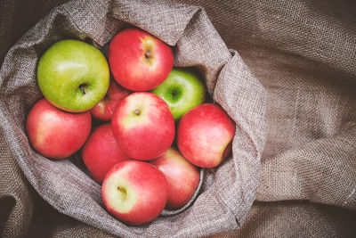 High angle view of apples in container