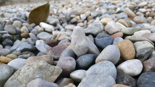 Close-up of pebbles on beach