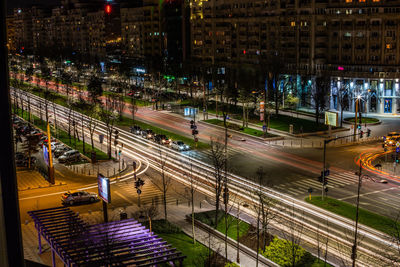 High angle view of light trails on road at night