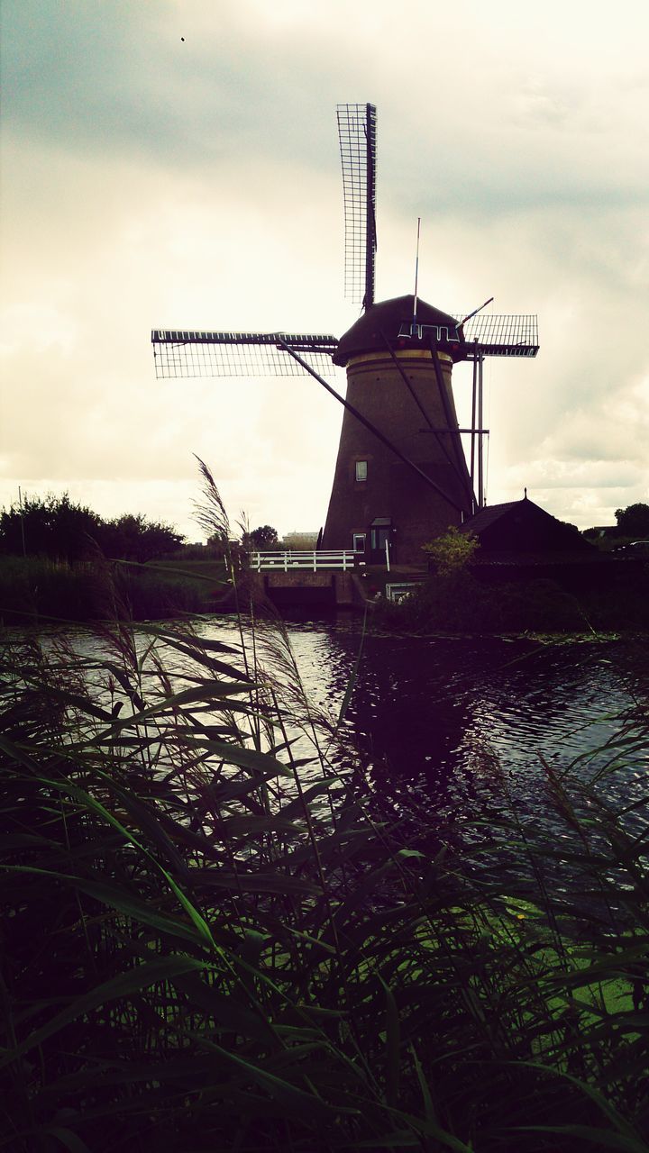 windmill, sky, wind power, wind turbine, alternative energy, environmental conservation, renewable energy, field, fuel and power generation, rural scene, built structure, traditional windmill, building exterior, architecture, cloud - sky, landscape, grass, nature, technology, tranquil scene