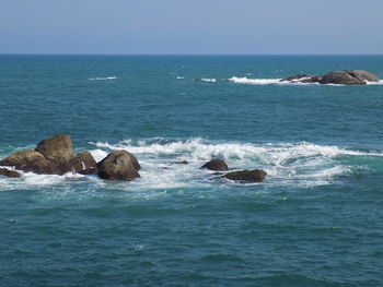 Scenic view of sea against clear sky