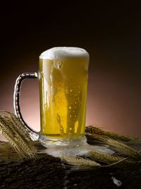 Close-up of beer glass on table