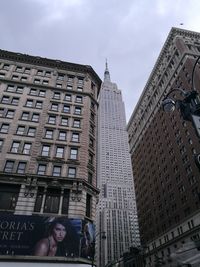 Low angle view of skyscrapers against sky