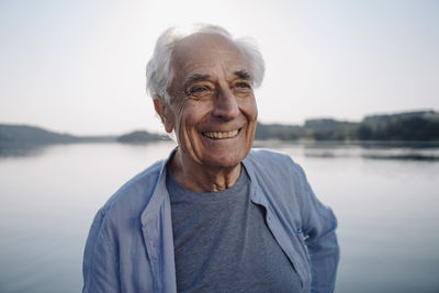 Portrait of smiling mid adult man in lake