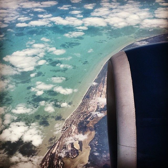 sky, transportation, part of, cropped, sea, water, mode of transport, cloud - sky, nautical vessel, aerial view, aircraft wing, nature, cloud, day, scenics, boat, airplane, travel, no people, beauty in nature