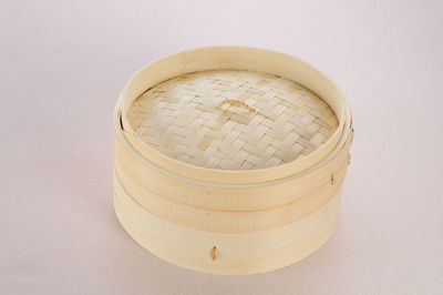 High angle view of wicker basket on table