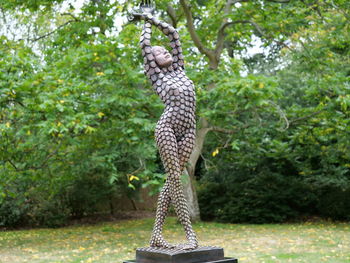 Giraffe against trees