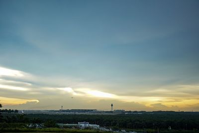 Scenic view of landscape against sky during sunset