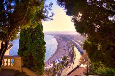 High angle view of swimming pool by sea against sky