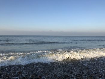 Scenic view of sea against clear sky