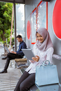 Young woman using laptop