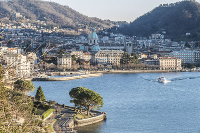 High angle view of river by buildings in city