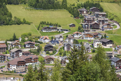 High angle view of houses and trees in town