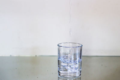 Close-up of water in glass on table