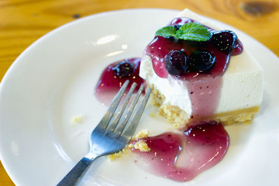 Close-up of cake slice in plate on table