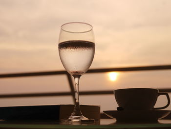 Close-up of wine in glass on table