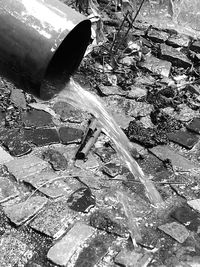 High angle view of water pipe on street