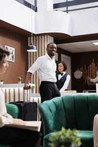 Portrait of young woman working in office