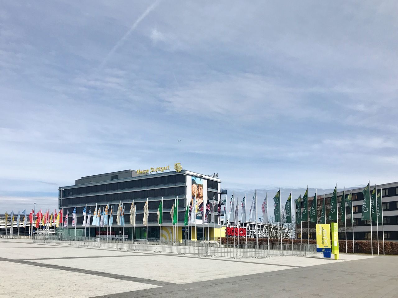 PORTRAIT OF PEOPLE IN BUILDING AGAINST SKY