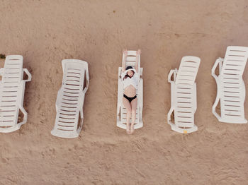 High angle view of objects on sand