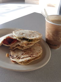 High angle view of breakfast served on table