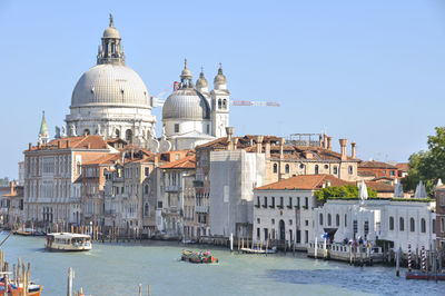 View of cathedral in city against clear sky