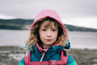 Close up portrait of young girl hiking in sweden