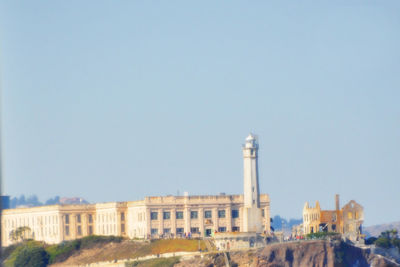 View of buildings against clear sky