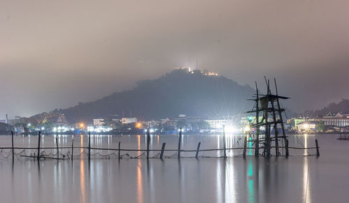 Scenic view of sea against sky at night