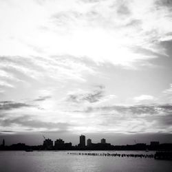 View of river against cloudy sky