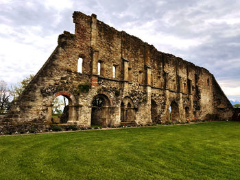 Low angle view of old building against sky
