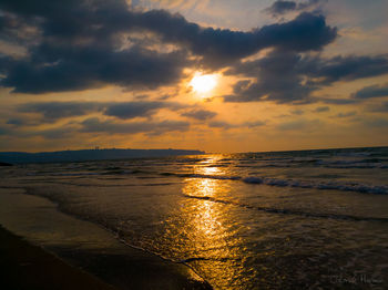 Scenic view of sea against sky during sunset