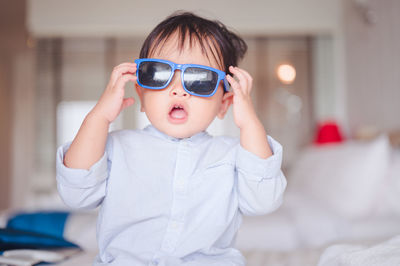 Portrait of cute boy at home