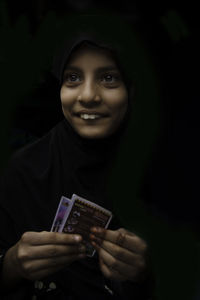 Portrait of a smiling young woman