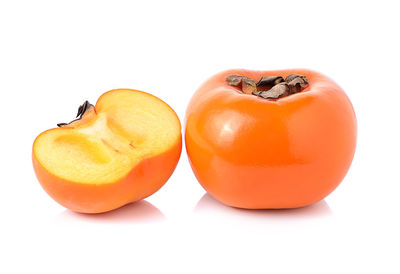 Close-up of orange against white background