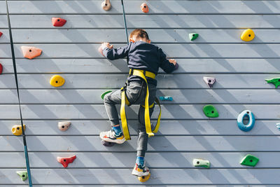 High angle view of people walking on table