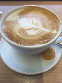 Close-up of coffee cup on table