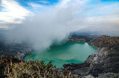 Panoramic view of volcanic landscape against sky