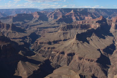 Aerial view of mountains against sky